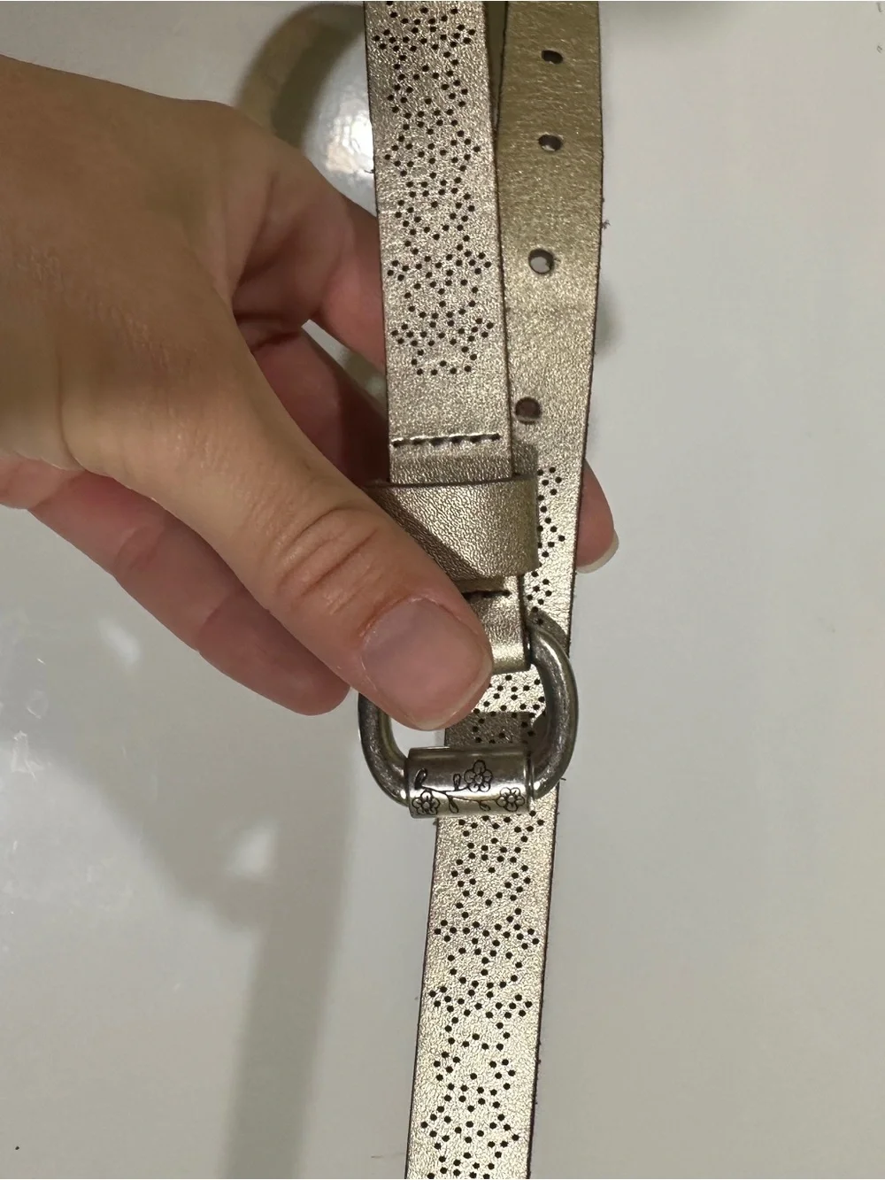 Fossil Metallic Gold Perforated Leather Belt with Floral Buckle